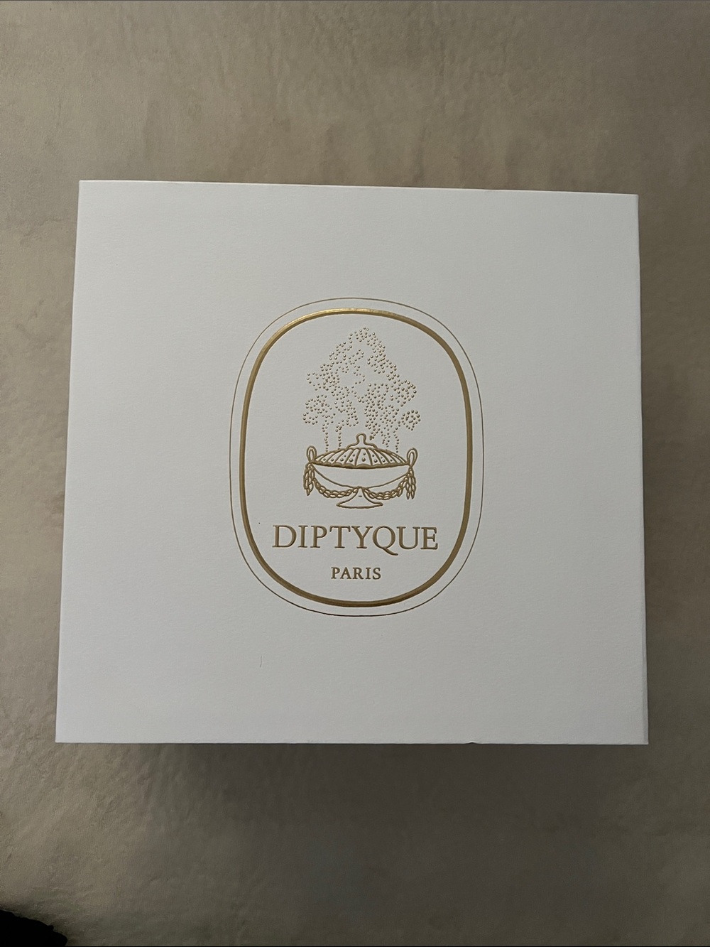 Diptyque Holiday Box with Gold Embossing and Holiday Ribbon